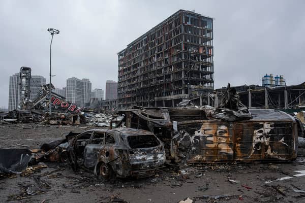 Burnt cars are seen in the parking lot of the Retroville trade center on April 3, 2022 in Kyiv, Ukraine. The Kyiv region has been liberated since 2 April.
