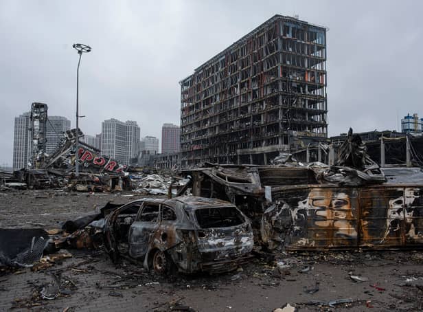 <p> Burnt cars are seen in the parking lot of the Retroville trade center on April 3, 2022 in Kyiv, Ukraine. The Kyiv region has been liberated since 2 April.</p>
