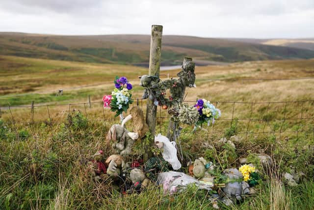A memorial to Winnie Johnson and Keith Bennett on Saddleworth Moor Credit: Getty
