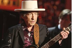 Bob Dylan has issued a rare public apology for selling books with automated signatures.  