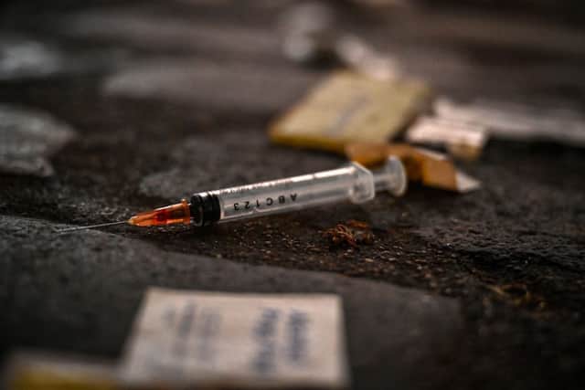 The Home Office said 300,000 heroin and crack addicts in England are responsible for nearly half of acquisitive crime, e.g. burglary and robbery, while drugs drive nearly half of all homicides (image: Getty Images)