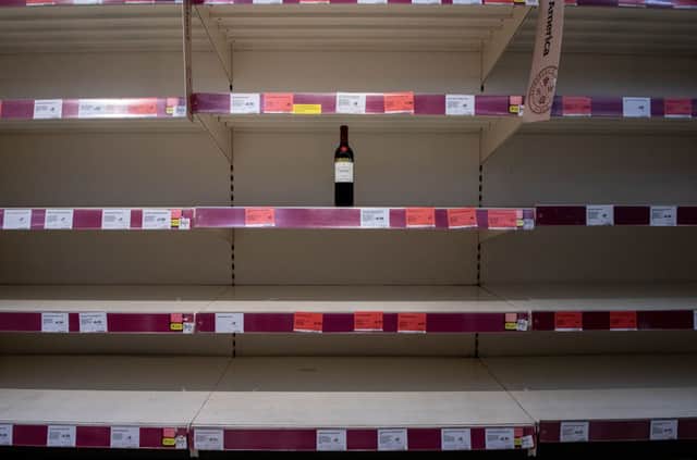 One bottle of shiraz red wine is left for sale on emptied shelves at a Sainsburys supermarket (Photo: Chris J Ratcliffe/Getty Images)
