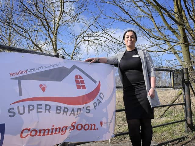 Gemma Lowery at the site where the holiday home is being built.