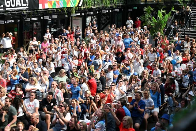  England fans at the Croydon Boxpark before the Women’s World Cup semifinal between England and Australia. London. Wednesday 16 2023.