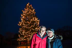 Avril and Christopher Rowlands bring Christmas joy to their town in Worcestershire with their annual Christmas tree, which grew from a £6 fir in 1978. (Credit: Emma Trimble / SWNS)