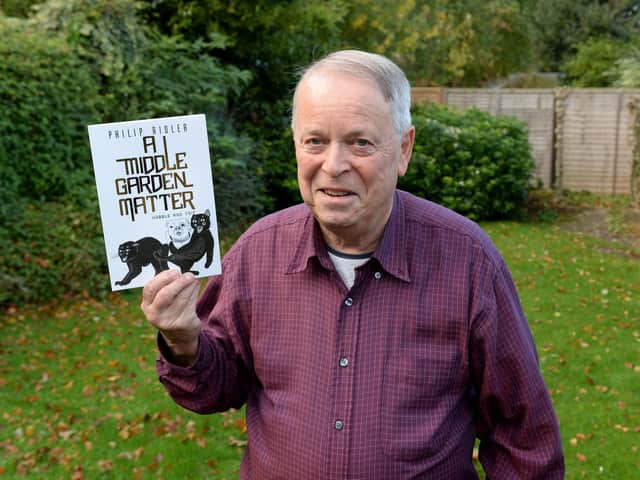 Author Philip Ridler with his new book