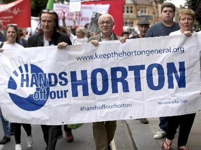 Charlotte Bird, far right, is pictured at an NHS demonstration with in Oxford