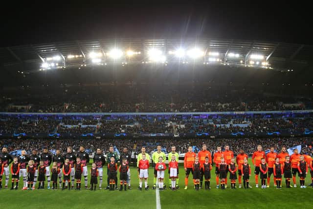 The teams, mascots and officials.