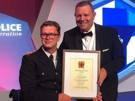 Acting Sergeant Tom Dorman, pictured receiving an Inspiration in Policing Award following the incident which resulted in him losing a leg