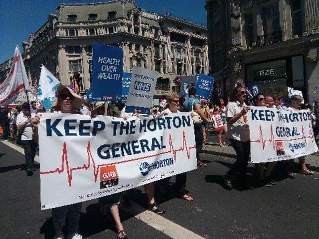 Banbury's hospital campaign group is pictured taking the town's fight for Horton services to parliament in a big pro-NHS march