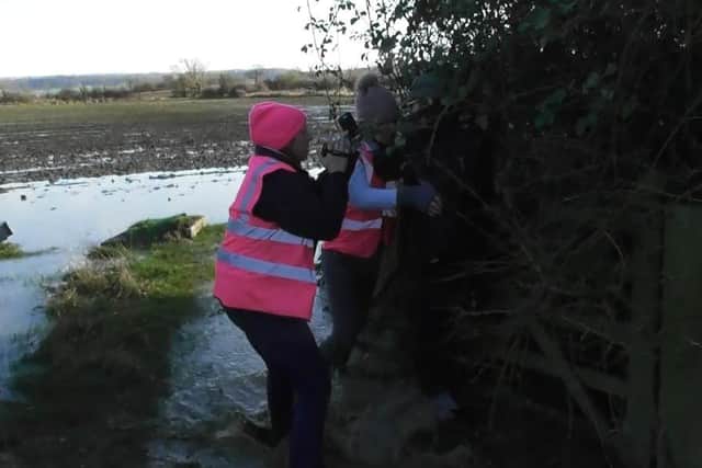Saboteurs try to get closer to the hunt but say ground crew in hi viz pink jackets physically prevent them