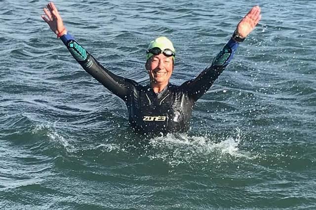 Jane Ablett is pictured in temperatures of two degrees in Loch Tay a few weeks ago
