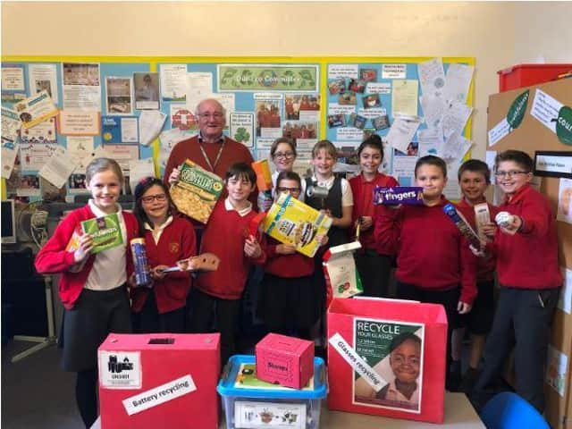 Cllr Norman MacRae with pupils from Great Rollright Primary School