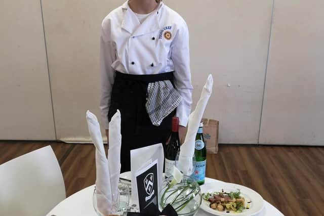Holly Brigden and the table that won her the district final of the Rotary Young Chef of the Year competition