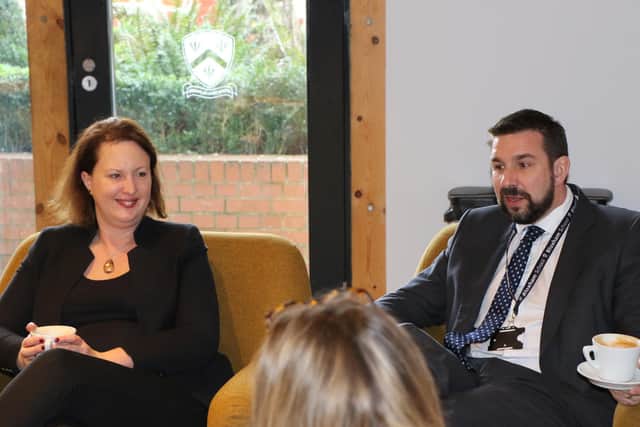 Victoria Prentis MP and Bloxham School head teacher Paul Sanderson talk to pupils about their book