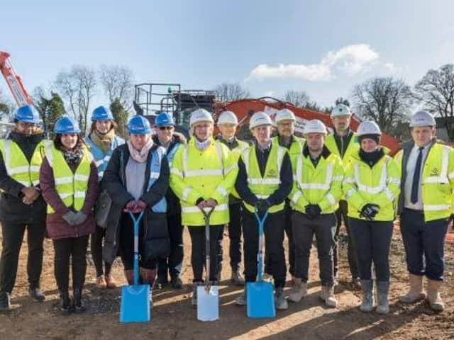 Members of the county, district and Housing 21 partnership are pictured at the ground-breaking ceremony in Chipping Norton