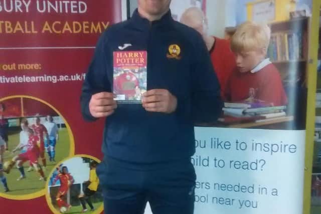 Banbury Utd goalkeeper Jack Harding with one of his favourite books, Harry Potter