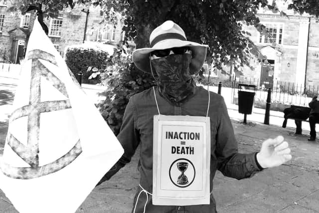 A demonstrator at the Banbury XR protest in the town centre on Thursday June 25 (photo by Tila Rodriguez Past)