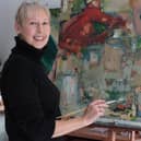 Jenny Eadon, from Great Bourton, with one of her paintings continues her 'remarkable'recovery after spending 77 days in the ICU from COVID-19. 
(photo from the Oxford University Hospitals NHS Foundation Trust)