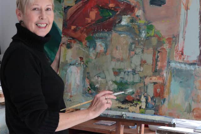 Jenny Eadon, from Great Bourton, with one of her paintings continues her 'remarkable'recovery after spending 77 days in the ICU from COVID-19. 
(photo from the Oxford University Hospitals NHS Foundation Trust)