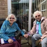 Dorcas Tobin (right) enjoyed the long-awaited reuntion with her twin sister, Edith Dumbleton (left,) to celebrate their 100th birthday together on Sunday June 28.