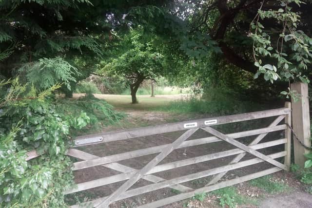 The access way to the site where development had been opposed by many nearby householders