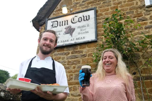 Dun Cow Hornton Chef Will Pratt and landlady Rebecca Yates celebrate the re-opening of the Dun Cow pub (photo by Roger Corke)