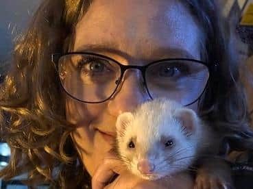King's Sutton portrait photographer Jannine Paxton-Timms gets herself in the frame with one of her three pet ferrets, Nippet, a girl, who is one year old.