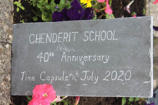 The plaque engraved by Assistant Headteacher Mr Woodcock for the time capsule buried at Chenderit School