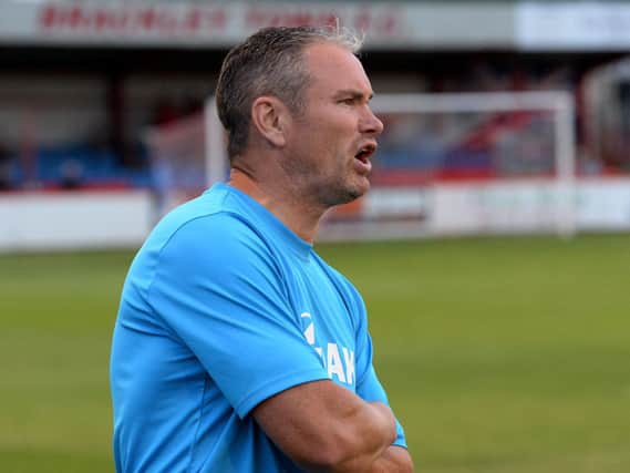 Brackley Town boss Kevin Wilkin and his players will begin their play-off bid this weekend