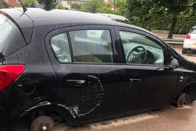 A black Vauxhall Corsa, which was vandalised and had some of its parts stolen while parked in Shipston