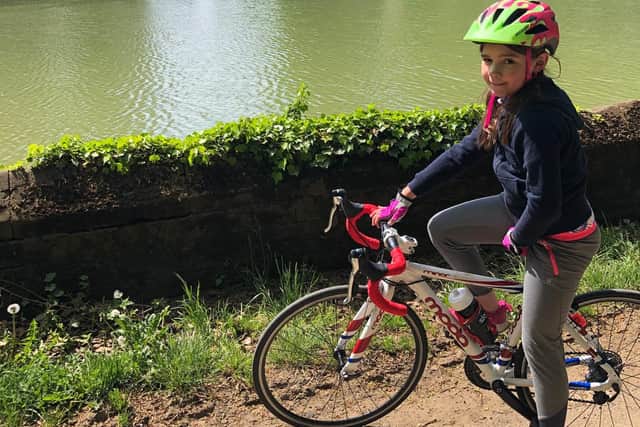 Jorgie Gillett, an 8-year-old pupil from Middleton Cheney Primary School, has cycled more than 230 miles during lockdown to benefit the charity, Dementia Oxfordshire.