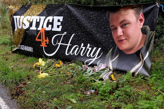 A Justice4Harry banner at the scene of his crash near Croughton