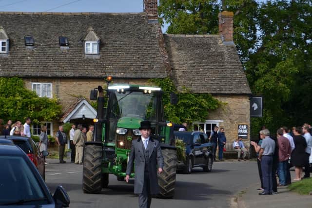 Jonnie Miall's funeral cortege passes his local in Duns Tew, The White Horse