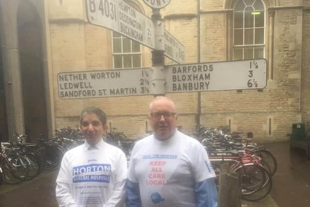 Councillors Arash Fatemian and Kieron Mallon wearing their Keep the Horton General campaign tee shirts at County Hall