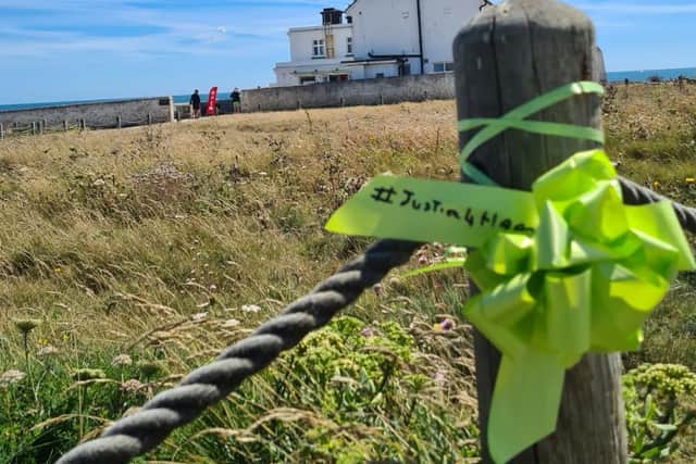 Harry Dunn's family left a green Justice4Harry ribbon at Portland Bill in Weymouth, Dorset, after spreading his ashes. Photo: Radd Seiger