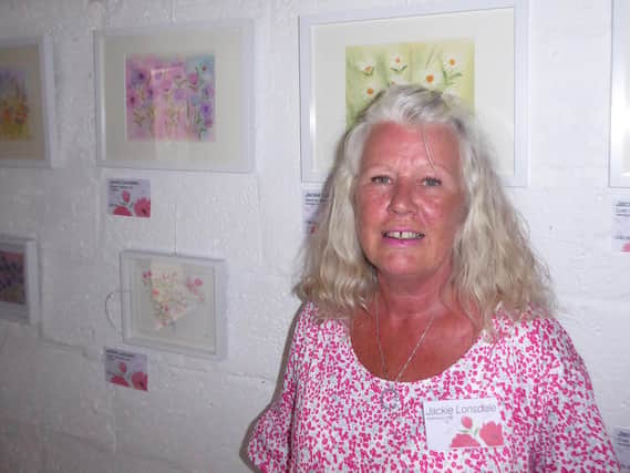 Jackie Lonsdale at her art exhibition in the Culworth Forge Coffee shop launched last weekend on Saturday August 1