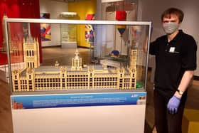 The Houses of Parliament at The Brick Built Exhibition: See the World in Lego Bricks inside the Banbury Museum.(Pictured: Dale Johnston exhibitions manager at the museum)