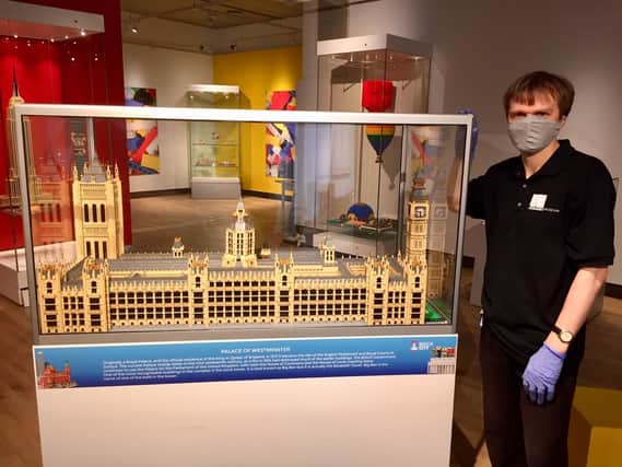 The Houses of Parliament at The Brick Built Exhibition: See the World in Lego Bricks inside the Banbury Museum.(Pictured: Dale Johnston exhibitions manager at the museum)