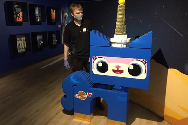 Unikitty from the Lego Movie with Dale Johnston exhibitions manager at the Banbury Museum