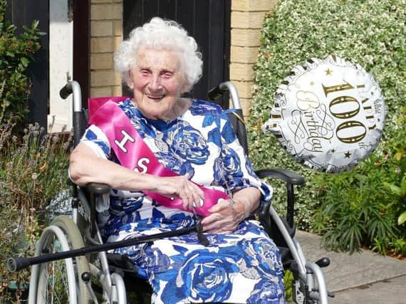 Louisa Hill celebrates her 100th birthday outside her Kineton home on Tuesday August 11 (photo by David Beaumont)
