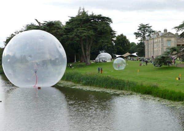 'Music of the Spheres – Story of Water' on the grounds of Compton Verney held on Sunday August 23 involving music, dance and huge orbs on water. (photo by Kineton resident David Beaumont)