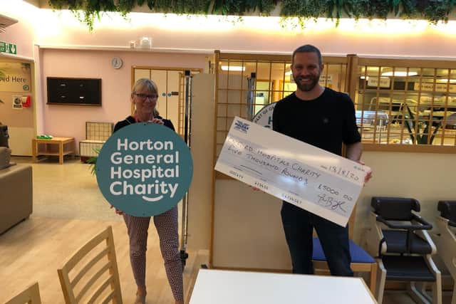 Tom Bodfish, organiser of the Banbury Quarantine Collective, recently presented a £5,000 cheque to the Horton staff.