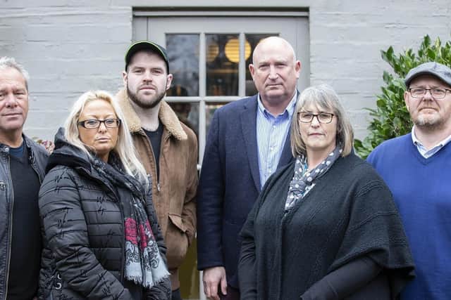 (L-R) Harry's step-father Bruce Charles, mother Charlotte Charles, step-brother Ciaran Charles, the family's spokesman, Radd Seiger, Harry's step-mother Tracey Dunn and father Tim Dunn