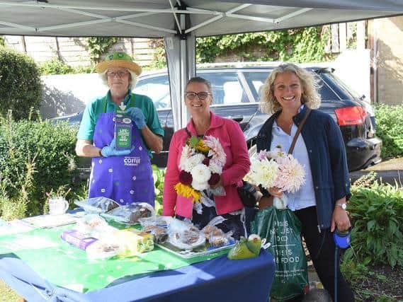 Great and Little Bourton raised 1,100 for Macmillan Cancer Support. Pictured here are Maggie MacAngus, Julie Liddle, and Anna Hardy. Photo by Barry Taylor.
