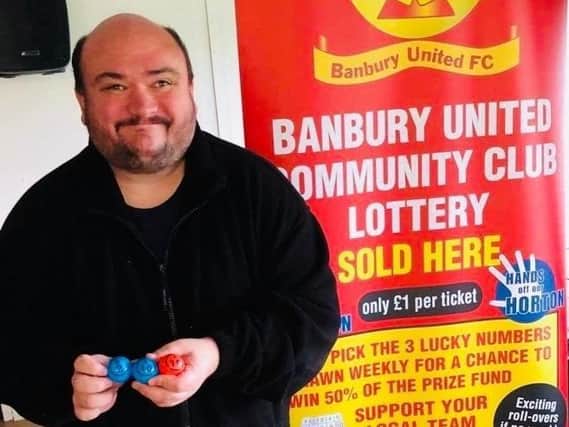 Kev Preedy with this week's winning balls in the Banbury Utd FC Community Lottery