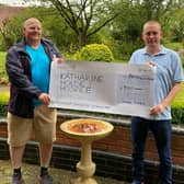 David Feeley and James Radbourn with a big cheque for Katharine House Hospice
