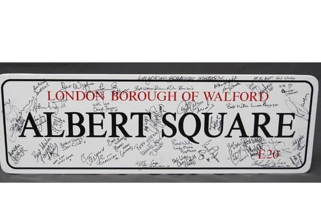Autographed EastEnders sign. Photo by Hansons.