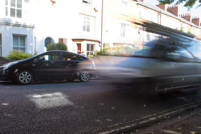 Motorists use Bath Road as a rat run between Warwick Road and Broughton Road. The vehicles make the street a danger to pedestrians and cyclists and pollute the environment. ©Geoff Crawford @gncmedia