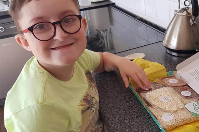 Nathan Best, aged 8, from Banbury is cared for by Helen & Douglas House and one of his favourite activities in baking.
